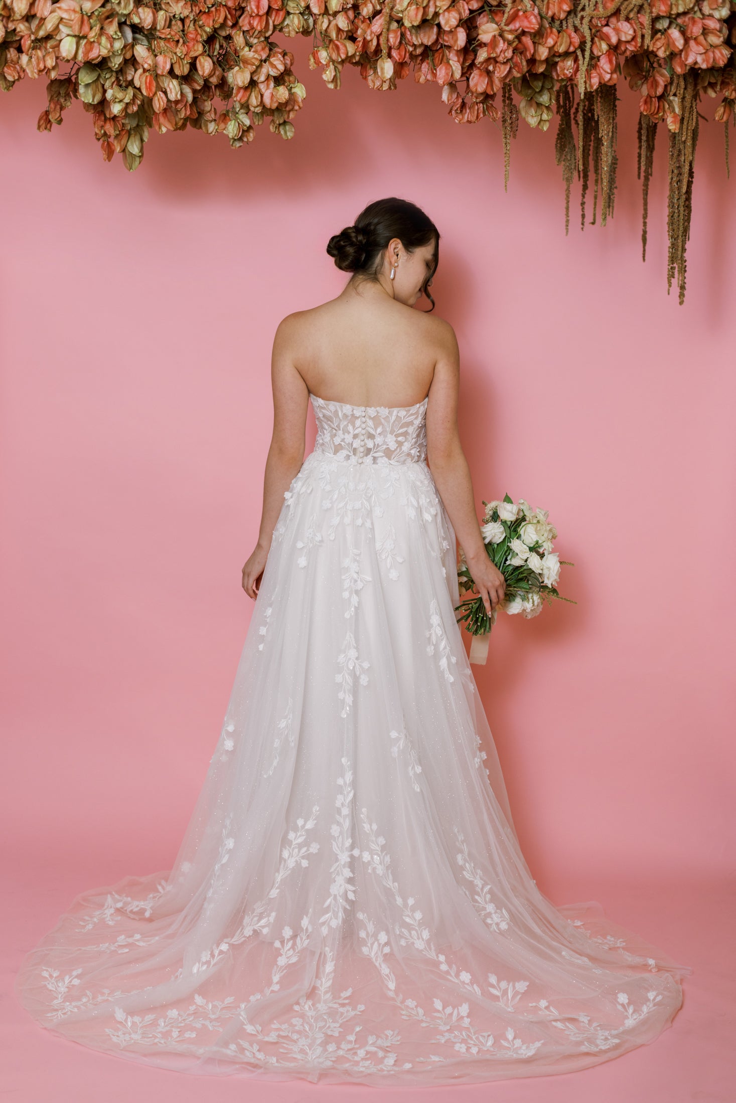 white wedding dress with pink underlay Lauren-Elaine-Duchess-Blush-Pink-Rosette-Silk-Corset-Basque-Waist-Wedding- Dress-with-Ruffle-Peplum.jpg?v=1746764555&width=3075