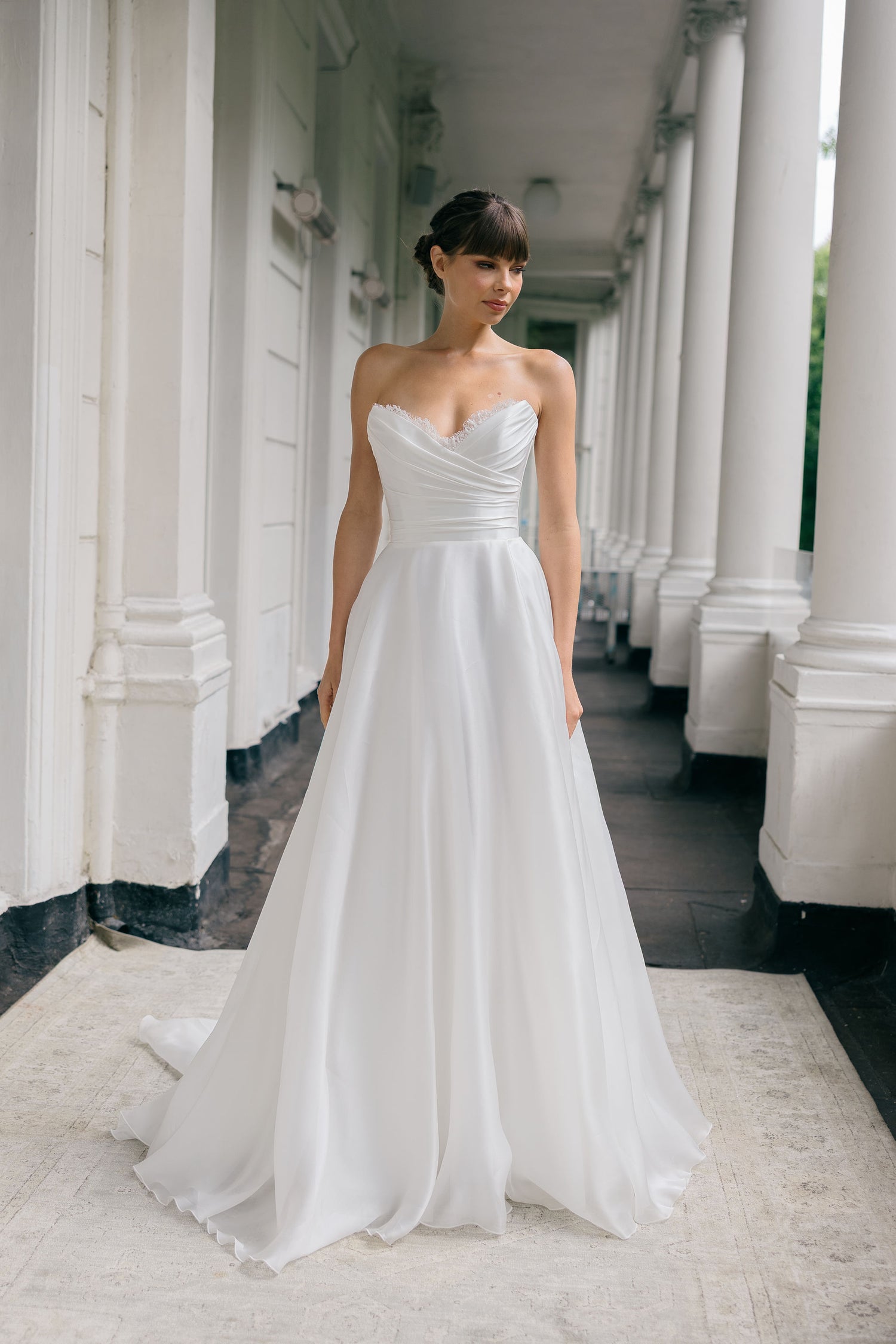 Silvaine by Suzanne Neville | Strapless Organza A-Line Wedding Dress The White Flower Silvaine by Suzanne Neville | Strapless Organza A-Line Wedding Dress The White Flower